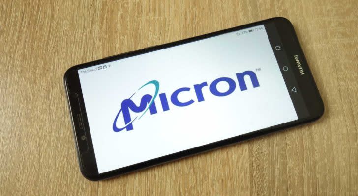 Micron (MU) logo on a mobile phone that's on a table