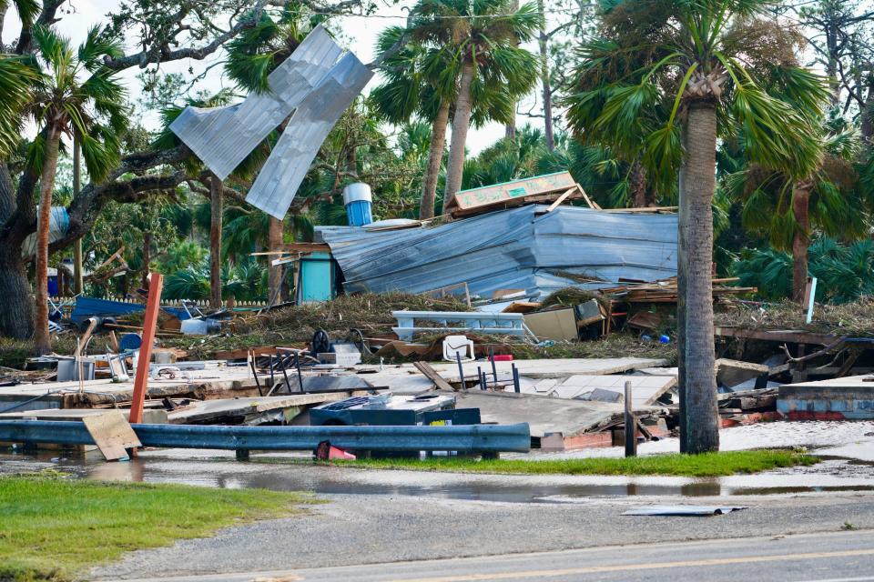 Damage and debris is seen in the aftermath of Hurricane Helene in Steinhatchee, Fla, on Friday, Sept. 27, 2024, the day after the storm made landfall in the Big Bend region of the state.