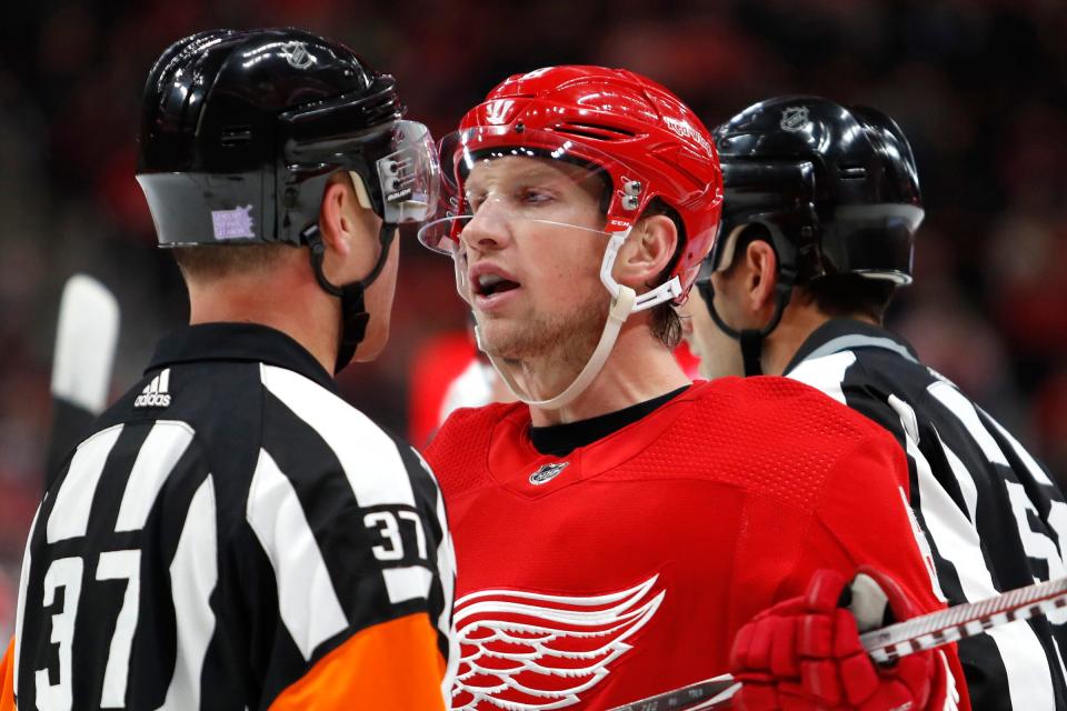Detroit Red Wings left wing Justin Abdelkader talks with referee Kyle Rehman during the second period against the Edmonton Oilers at Little Caesars Arena, Nov. 3, 2018.