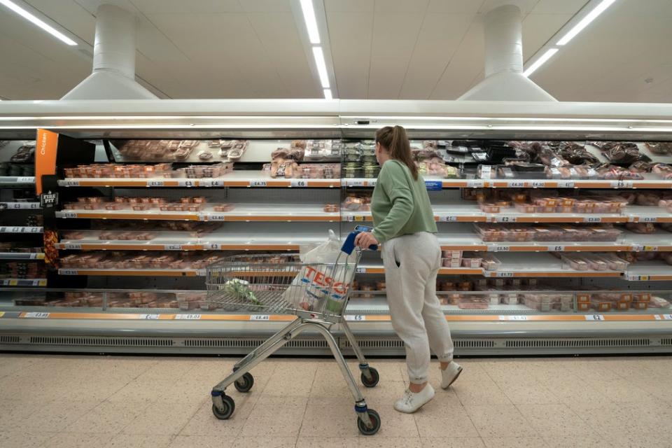 Stock image: A view of empty shelves at a Tesco supermarket in Manchester  (AP)