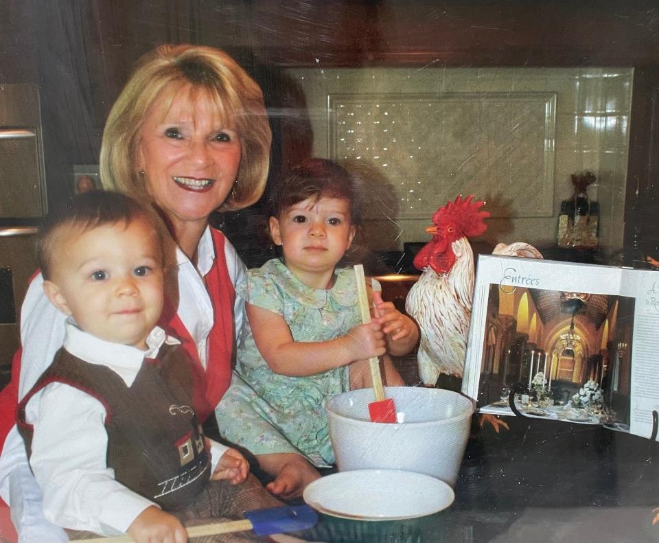 Susan Whelchel bakes with two of her 10 grandchildren.