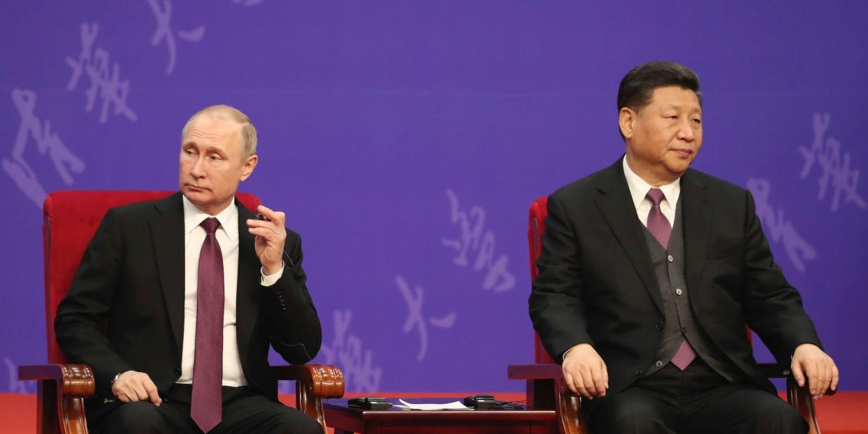 Vladimir Putin and Xi Jinping