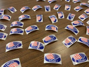  “I Voted” stickers are displayed at a Richmond polling place during the 2022 midterm elections. (Graham Moomaw/Virginia Mercury)