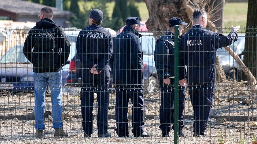 Police inspect site of a drone crash in Zagreb, Croatia, Friday