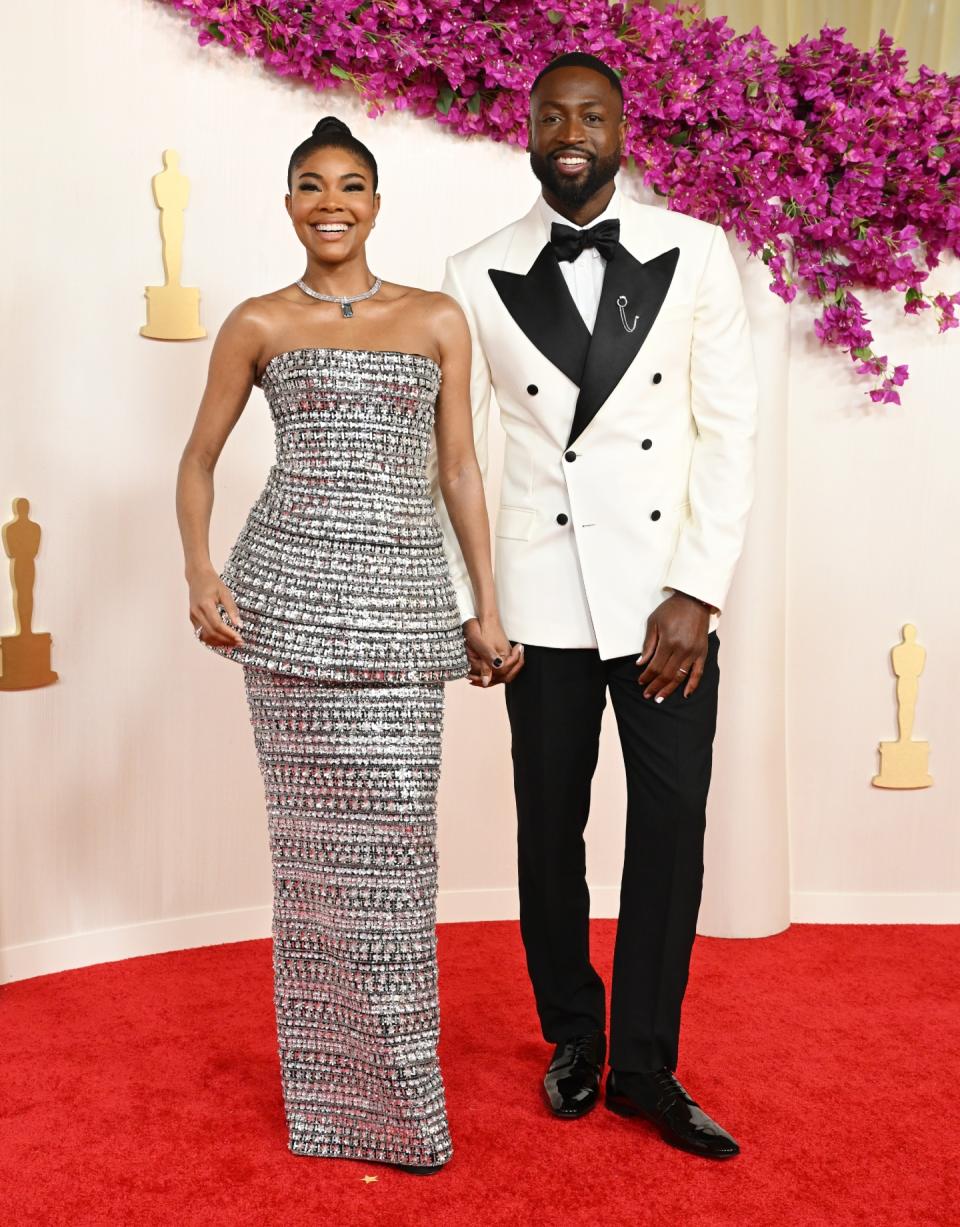 Gabrielle Union and Dwyane Wade at the 96th Annual Oscars held at at the Ovation Hollywood on March 10, 2024 in Los Angeles, California.