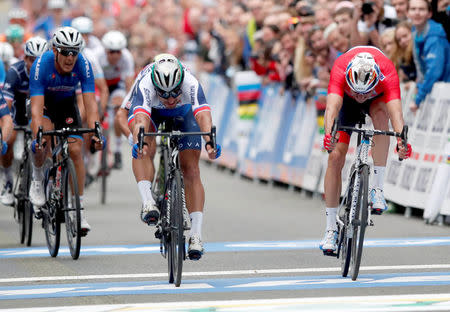 Cycling - UCI Road World Championships - Men Elite Road Race - Bergen, Norway - September 24, 2017 - Peter Sagan (C) of Slovakia finishes in first and Alexander Kristoff (R) of Norway in second place in Men Elite Road Race at the UCI 2017 Road World Championship, Bergen, Norway. NTB SCANPIX/Cornelius Poppe via REUTERS