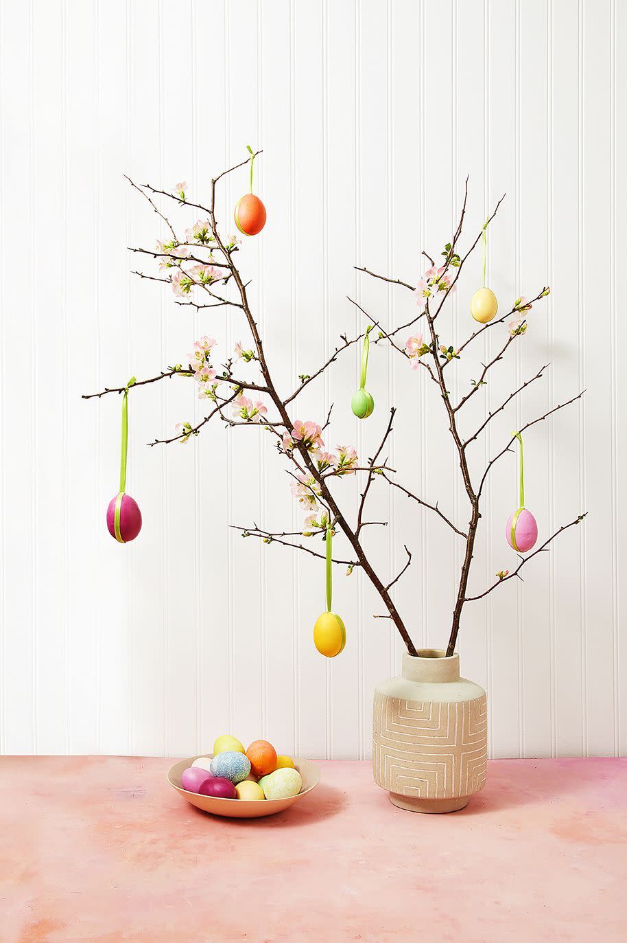 <p>Christmas isn't the only holiday worthy of a tree. Make a much smaller version of the Christmas classic with this fun display. </p><p><strong><em>Get the tutorial at <a href="https://www.goodhousekeeping.com/holidays/easter-ideas/g2217/easter-decorations/?slide=2" rel="nofollow noopener" target="_blank" data-ylk="slk:Good Housekeeping.;elm:context_link;itc:0;sec:content-canvas" class="link ">Good Housekeeping. </a></em></strong></p>