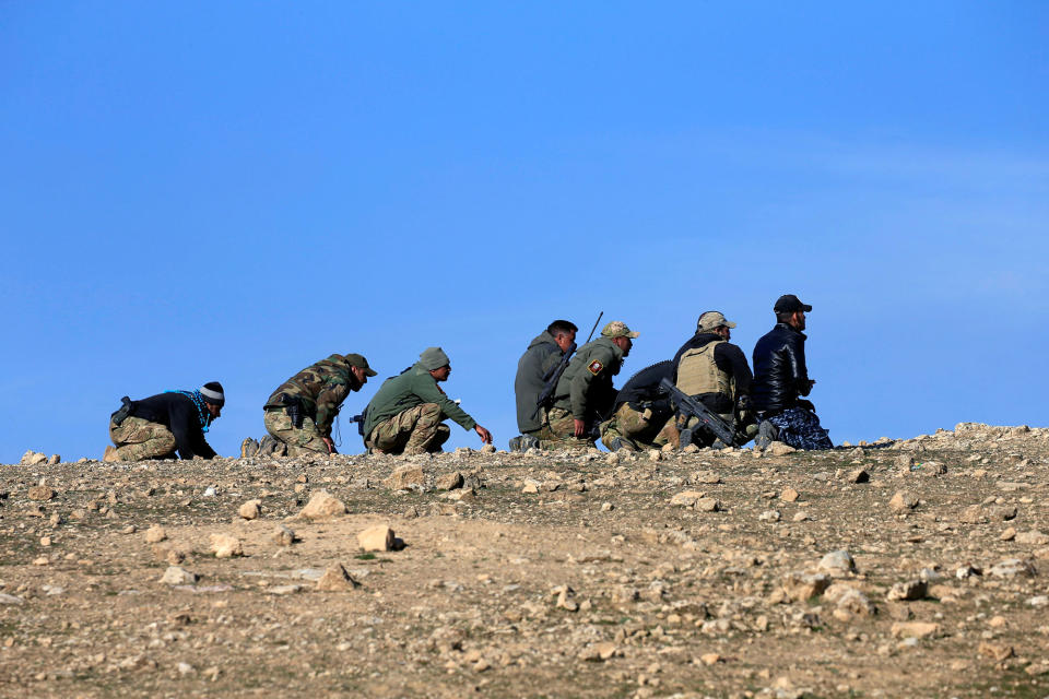 <p>Members of the Iraqi rapid response forces gather during a battle with Islamic State militants south of Mosul, Iraq, Feb. 20, 2017. (Alaa Al-Marjani/Reuters) </p>