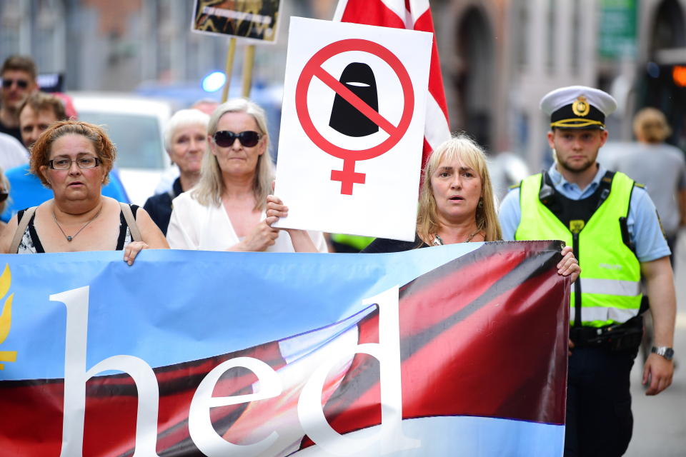 People take part in a demonstration organized by the 'For Frihed' (For Freedom), which supports the face veil ban, on Aug. 1, 2018. (Photo: BAX LINDHARDT via Getty Images)