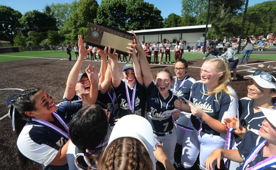 Sutherland players celebrates their Class A2 title. 