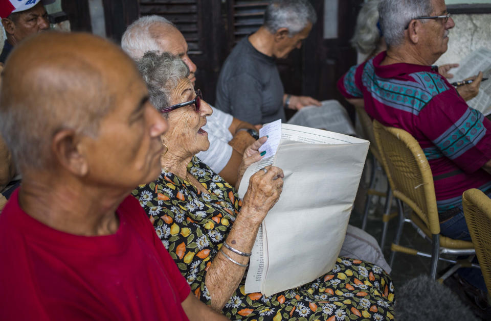 In this Sept. 30, 2018 photo, a woman gives her opinion during a public forum on constitutional reform in Havana, Cuba. The single-party government is supposed to review public comments and incorporate suggestions into a final version that before putting it to a popular referendum on Feb. 24. (AP Photo/Desmond Boylan)