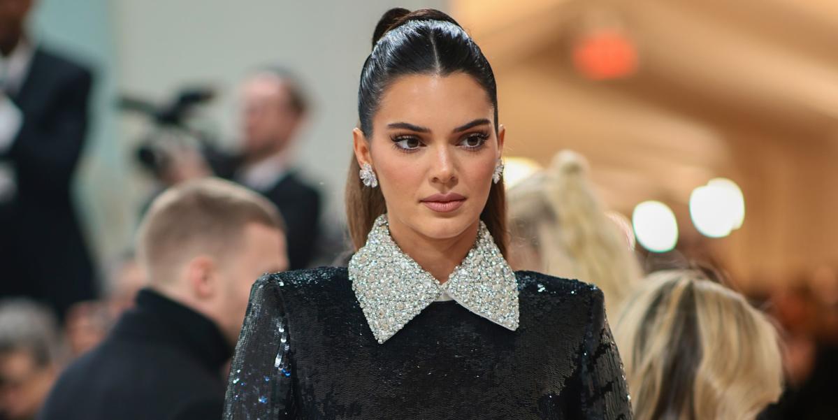 Kendall Jenner looks effortlessly stylish as she steps out in semi-sheer  black lace dress