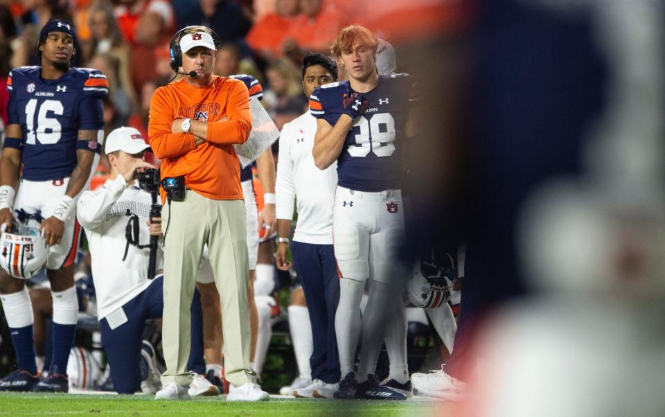 Auburn Tigers head coach Hugh Freeze watches on as Auburn Tigers take on Mississippi Rebels at Jordan-Hare Stadium in Auburn, Ala., on Saturday, Oct. 21, 2023. Mississippi Rebels defeated Auburn Tigers 28-21.