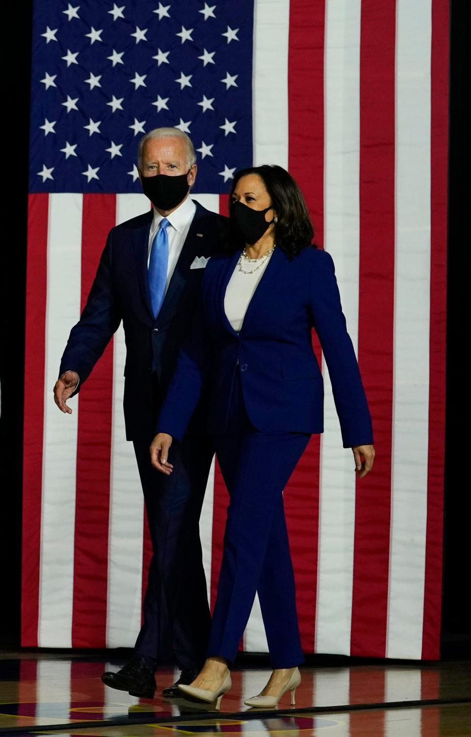 Democratic presidential candidate Joe Biden and his running mate, Sen. Kamala Harris, arrive for a campaign event at A.I. du Pont High School in Greenville, Del., on Aug. 12.