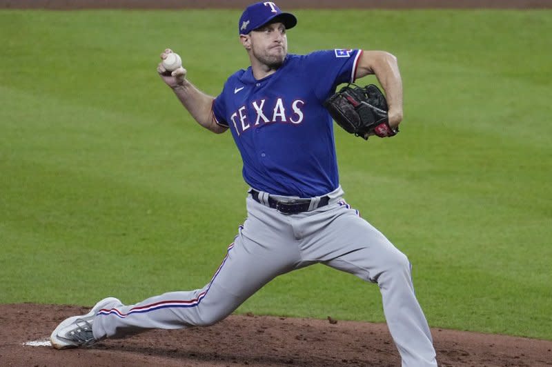 Texas Rangers starting pitcher Max Scherzer throws in the first inning against the Houston Astros in Game 7 of the ALCS on Monday at Minute Maid Park in Houston. Photo by Kevin M. Cox/UPI