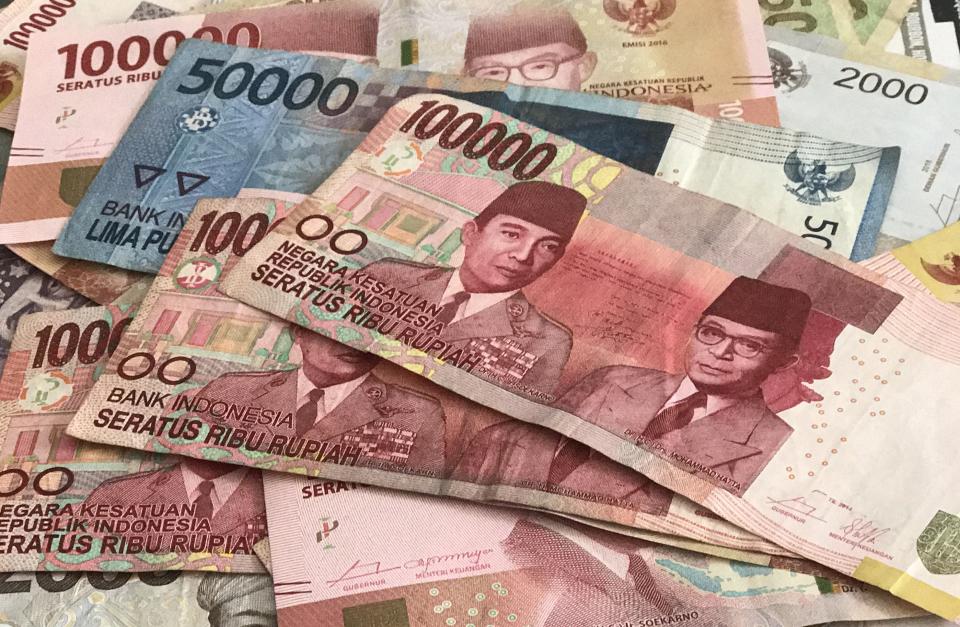 Picture of bills of Indonesian currency - the Rupiah - taken in Jakarta, Indonesia, 15 August 2017. Photo: Christoph Sator/dpa (Photo by Christoph Sator/picture alliance via Getty Images)