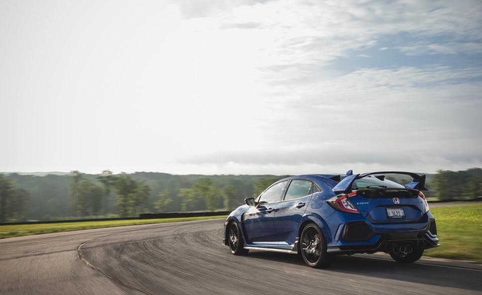 <p>The rare Lightning Lap photo in which the driver wasn't asked to do anything insane for the photographers. The sun shines on good decisions and <a rel="nofollow noopener" href="https://www.caranddriver.com/features/2018-honda-civic-type-r-lightning-lap-2018" target="_blank" data-ylk="slk:Honda Civic Type R;elm:context_link;itc:0;sec:content-canvas" class="link ">Honda Civic Type R</a>s.</p>