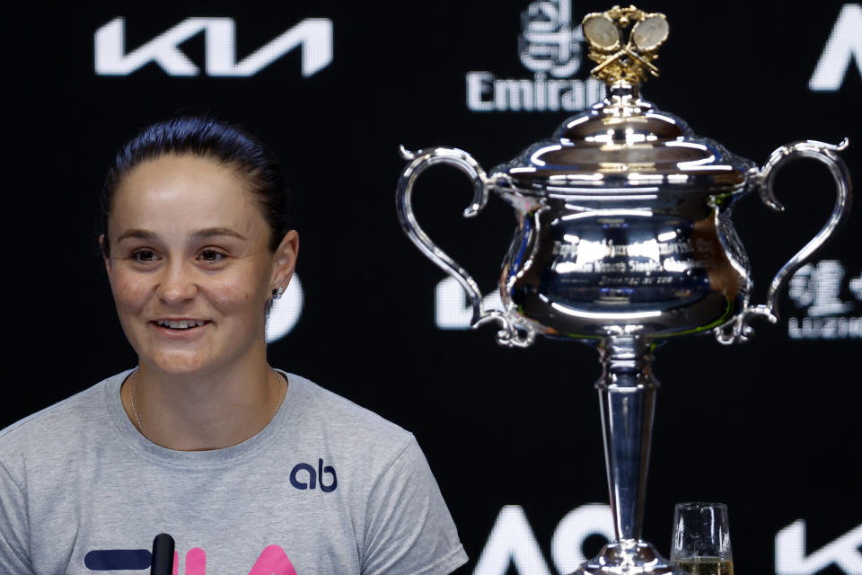 Ash Barty of Australia addresses a press conference after defeating Danielle Collins of the U.S., to win the Daphne Akhurst Memorial Cup in the women's singles final at the Australian Open tennis championships in Saturday, Jan. 29, 2022, in Melbourne, Australia. (AP Photo/Hamish Blair)