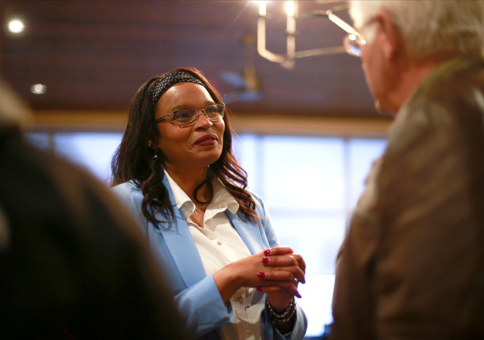 Republican congressional candidate Nicole Hasso talks with potential supporters during a meet-and-greet event at the Pioneers Pub & Grub in Casey on April 20.