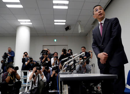 Nissan President and Chief Executive Officer Hiroto Saikawa arrives to attend a news conference after Japanese media reported that Nissan Chairman Carlos Ghosn will be arrested on suspicion of under-reporting his salary, at the company headquarters in Yokohama, south of Tokyo, Japan November 19, 2018. REUTERS/Issei Kato