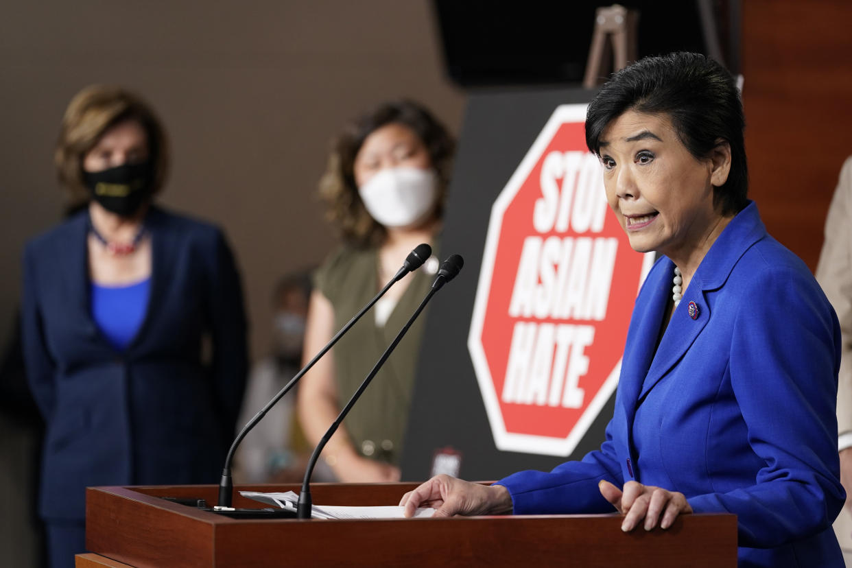 Rep. Judy Chu, D-Calif., right, speaks during a news conference on Capitol Hill in Washington, Tuesday, May 18, 2021, on the COVID-19 Hate Crimes Act as House Speaker Nancy Pelosi of Calif., left, and Rep. Grace Meng, D-N.Y., center, listen. (AP Photo/Susan Walsh)