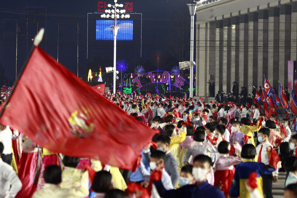 Students and youth attend a dancing party in celebration of the 110th birth anniversary of its late founder Kim Il Sung at Kim Il Sung Square in Pyongyang, North Korea Friday, April 15, 2022. (AP Photo/Cha Song Ho)