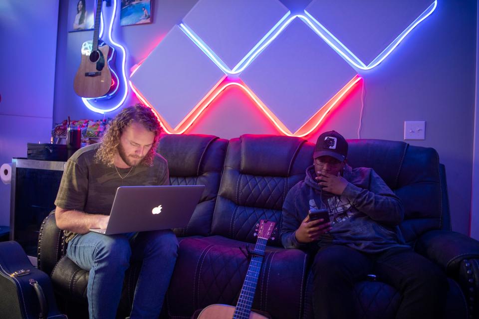 Nick Wayne and RVSHVD work together on a song at Sound Studios in Nashville, Tenn., Friday, Dec. 8, 2023.