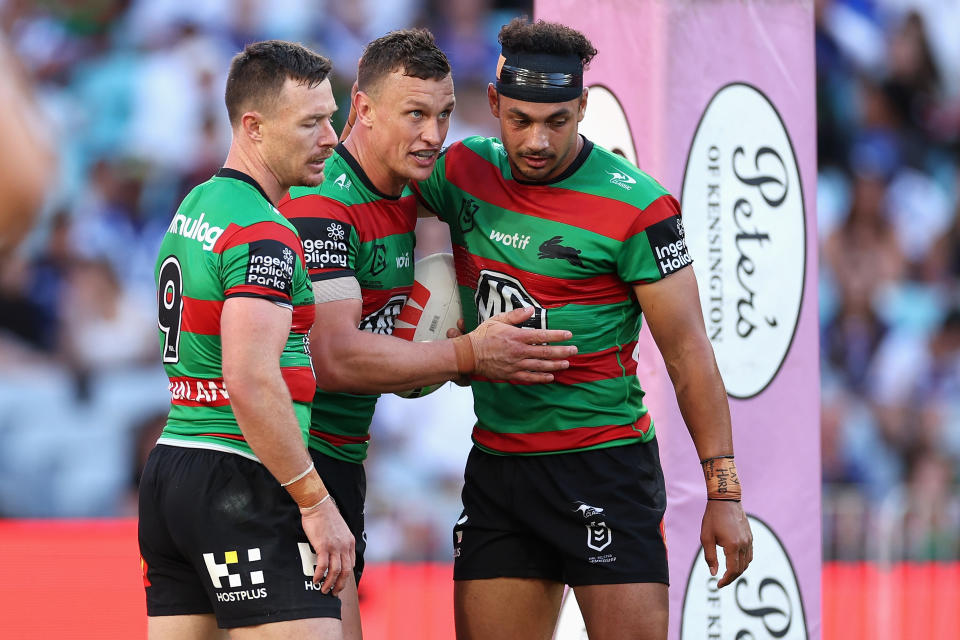 SYDNEY, AUSTRALIA - MARCH 29: Jack Wighton of the Rabbitohs celebrates scoring a try with team mates during the round four NRL match between South Sydney Rabbitohs and Canterbury Bulldogs at Accor Stadium, on March 29, 2024, in Sydney, Australia. (Photo by Cameron Spencer/Getty Images)