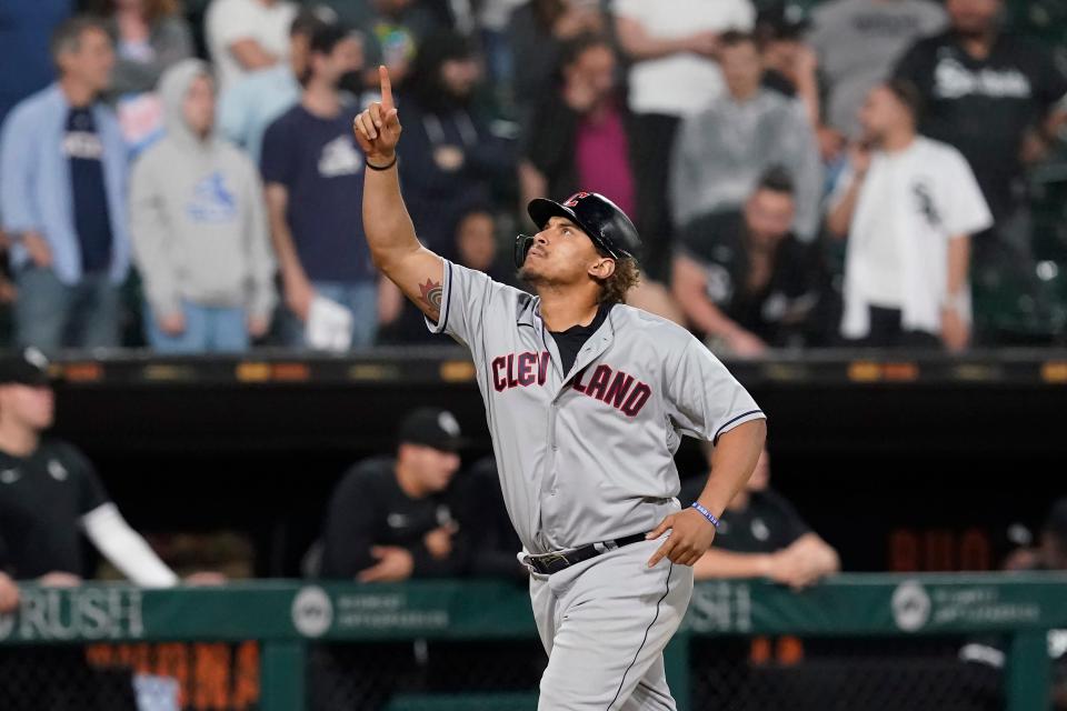 Guardians first baseman Josh Naylor celebrates his score-tying grand slam off Chicago White Sox relief pitcher Liam Hendriks during the ninth inning of Monday night's game in Chicago. [Charles Rex Arbogast/Associated Press]