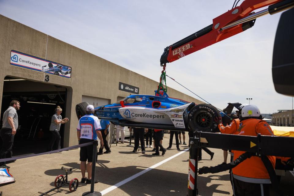 driver stefan wilson 24 car is brought to his garage after