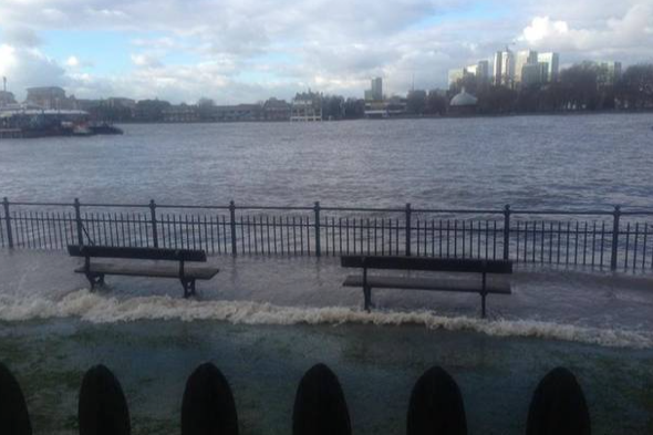 River Thames bursts banks high spring tide