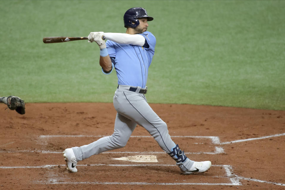FILE - In this Saturday, July 11, 2020, file photo, Tampa Bay Rays' Kevin Kiermaier bats during baseball practice in St. Petersburg, Fla. (AP Photo/Mike Carlson, File)