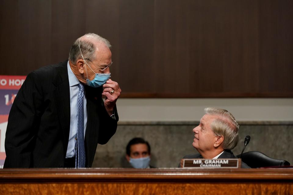 Chairman of the Senate Judiciary Committee Sen. Lindsey Graham (R-SC), talks to Sen. Chuck Grassley (R-IA) (L) before a hearing on Wednesday, September 30, 2020 on Capitol Hill in Washington, DC.