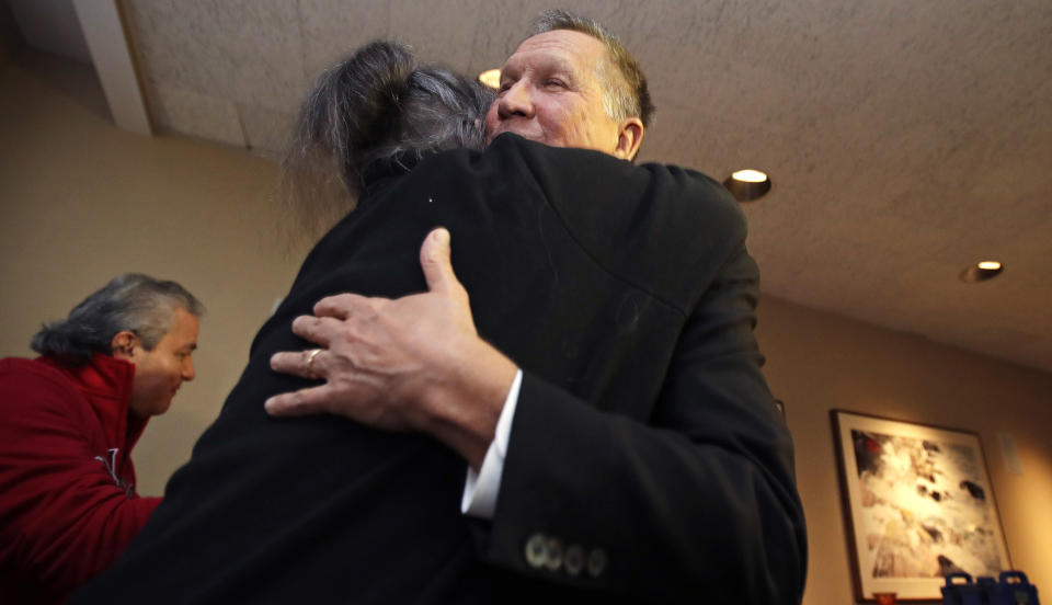 Ohio Gov. John Kasich, a potential 2020 Presidential candidate, is embraced by a supporter in Concord, N.H., Thursday, Nov. 15, 2018. The visit marked Gov. Kasich's second trip to the state this year. (AP Photo/Charles Krupa)