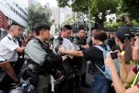 People attend a protest in Hong Kong