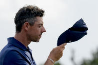 Rory McIlroy, of Northern Ireland, tips his hat to the crowd on the 18th hole during the third round of the PGA Zurich Classic golf tournament at TPC Louisiana in Avondale, La., Saturday, April 27, 2024. McIlroy and teammate Shane Lowry finished the round tied for third place. (AP Photo/Matthew Hinton)