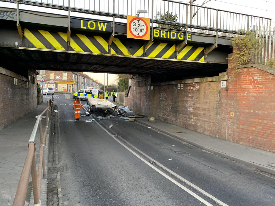The bus roof "peeled off" when its driver attempted to pass under a low bridge (York Press/SWNS)