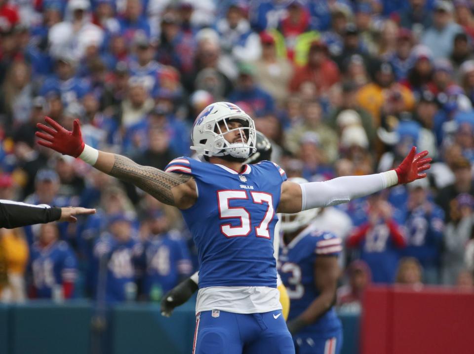 Bills defensive end A.J. Epenesa celebrates a big third down stop against Pittsburgh in the first half during their game Sunday, Oct. 9, 2022 at Highmark Stadium in Orchard Park. 
