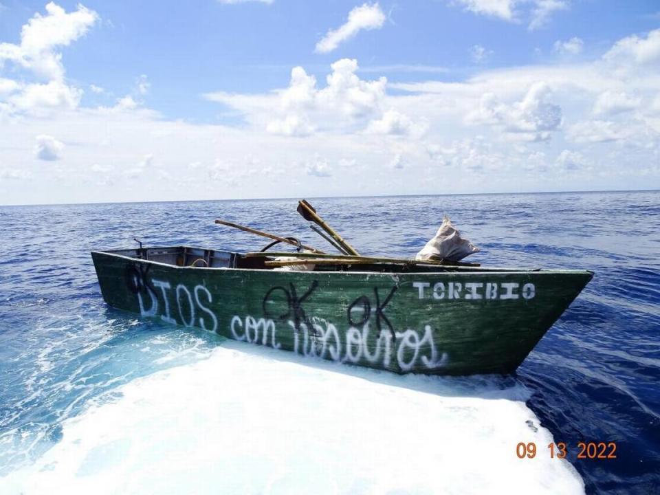 A Cuban migrant boat with ‘Dios con nosotros,’ or ‘God is with us,” floats about 45 miles south of the Marquesas Keys Tuesday, Sept. 13, 2022.