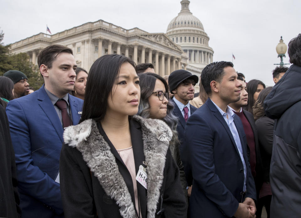 <p>“Dreamers,” people brought to the U.S. illegally as children, and other supporters of the Deferred Action for Childhood Arrivals program, listen as lawmakers speak at the Capitol in Washington on Jan. 10, 2018. (Photo: J. Scott Applewhite/AP) </p>