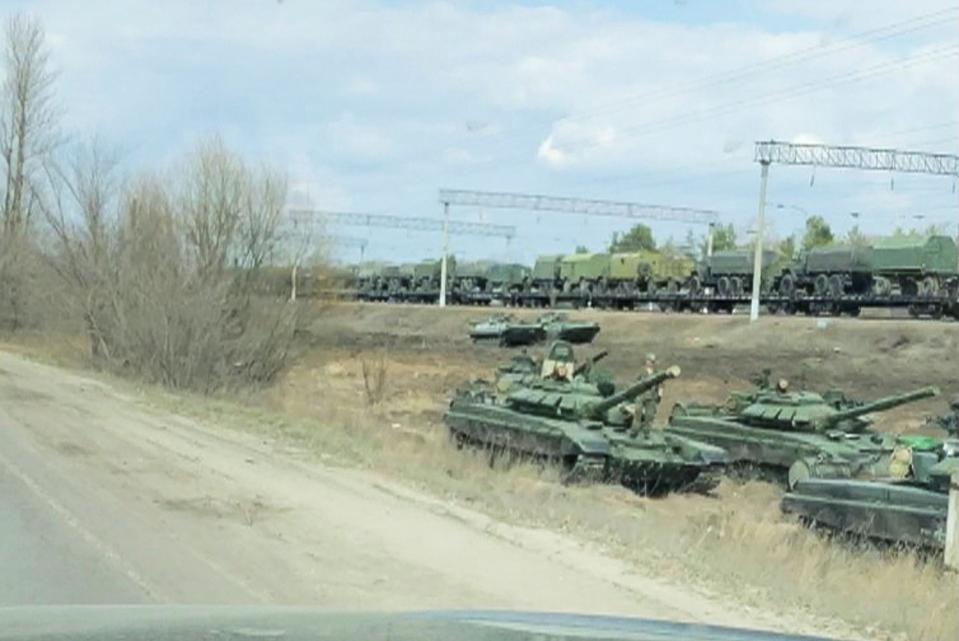 <p>A still image from video shows tanks and military vehicles in Maslovka, Voronezh Region, Russia</p> (REUTERS)