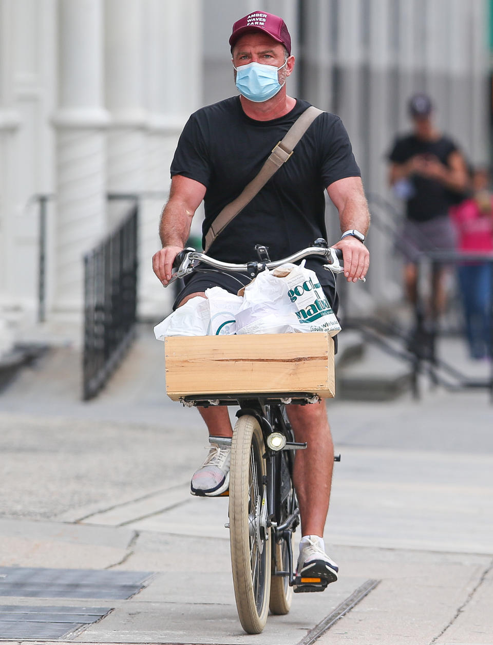 <p>Liev Schreiber runs errands on his bike on Thursday in N.Y.C.</p>