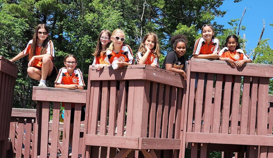Following their pizza party courtesy of Papa Gino's "Pizza My Heart" program, members of the Chair City 3/4 girls soccer team kept the part going by enjoying some time at the Ovila Case Playground in Gardner. From left to right: Brooke, Alivia, Lily, Giuliana, Sophia, Mya, Romina, Jasmine.