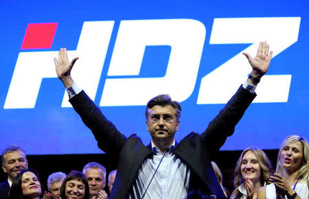 FILE PHOTO: Andrej Plenkovic, president of Croatian Democratic Union (HDZ), waves to his supporters during an election rally in Zagreb, Croatia, September 8, 2016. REUTERS/Antonio Bronic/File PictureRTSRLBI/File Photo