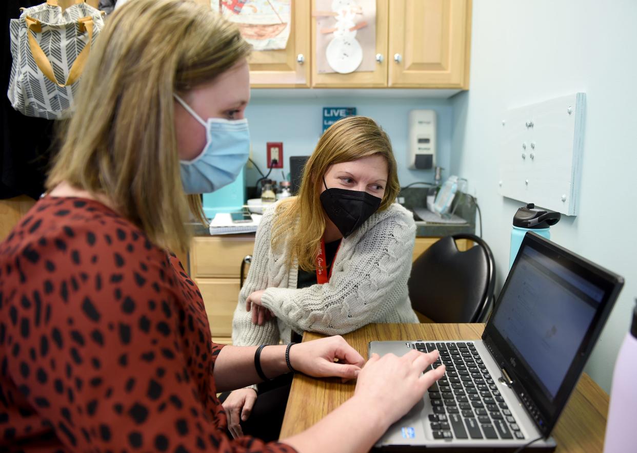 Heather Haddock, midwife, speaks with student intern Jamie Gordon Wednesday, Feb. 2, 2022, at La Red Health Center in Georgetown, Delaware.