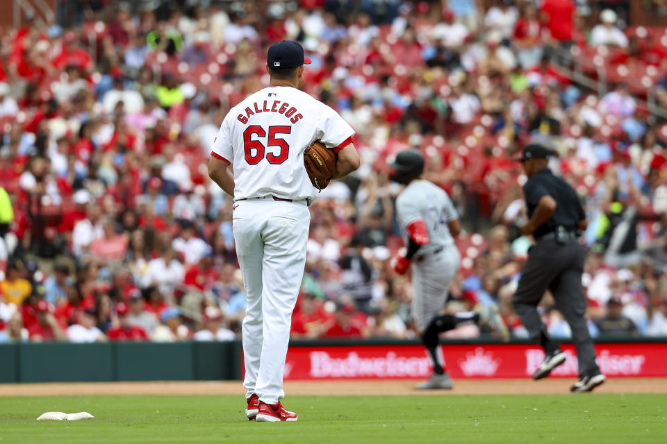 St. Louis Cardinals pitcher Giovanny Gallegos (65) watches as Chicago White Sox's Eloy Jiménez runs the bases after hitting a solo home run during the seventh inning of a baseball game, Sunday, May 5, 2024, in St. Louis. (AP Photo/Scott Kane)
