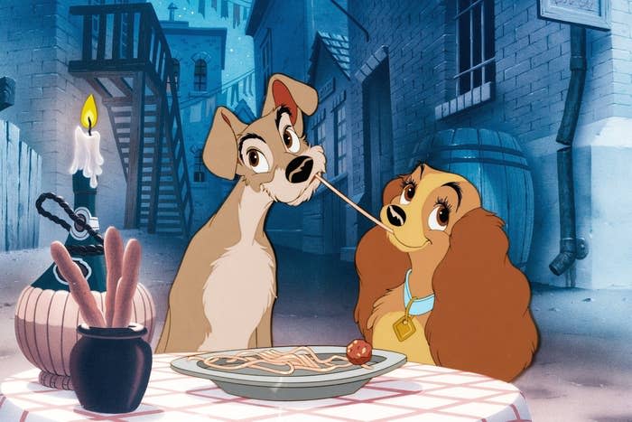 The dogs from "Lady and the Tramp" sharing pasta