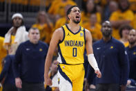 Indiana Pacers guard Tyrese Haliburton reacts during the first half against the Milwaukee Bucks in Game 6 in an NBA basketball first-round playoff series, Thursday, May 2, 2024, in Indianapolis. (AP Photo/Michael Conroy)
