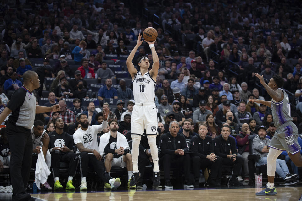 Brooklyn Nets forward Yuta Watanabe (18) puts up a three point shot in the first quarter of an NBA basketball game against the Sacramento Kings in Sacramento, Calif., Tuesday, Nov. 15, 2022. (AP Photo/José Luis Villegas)