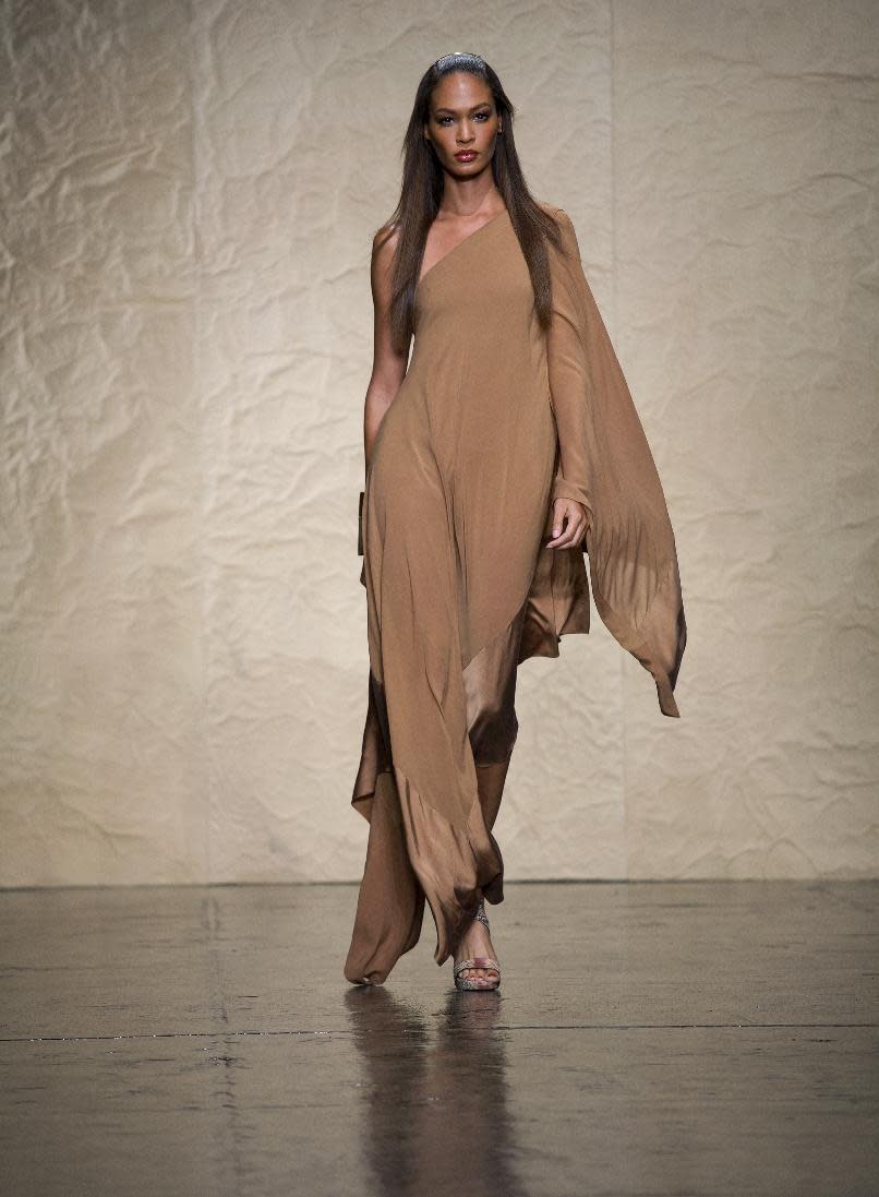 The Donna Karan Spring 2014 collection is modeled during Fashion Week in New York, Monday, Sept. 9, 2013. (AP Photo/Craig Ruttle)
